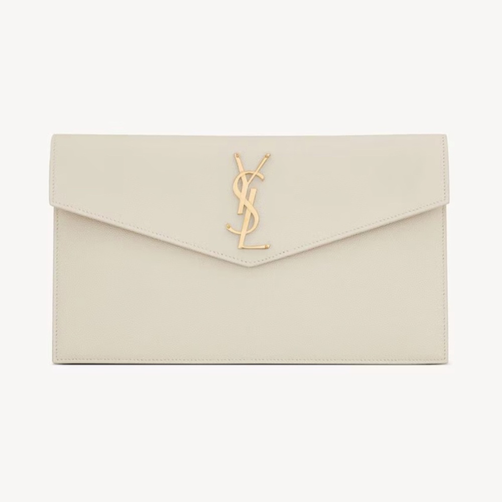 YSL SMALL ENVELOPE CLUTCH WITH A FLAP FEATURING THE CASSANDRE.